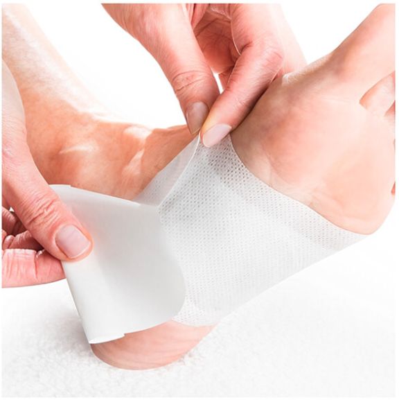 Step 2: applying the second Nuubu pad to the other foot